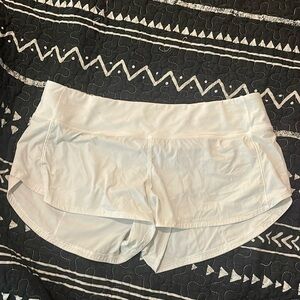 Low-Rise LuluLemon 2.5” Speed Up short shorts in white